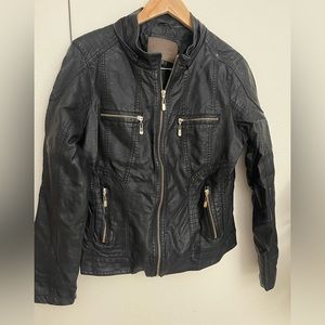 Black jacket with gold hardware